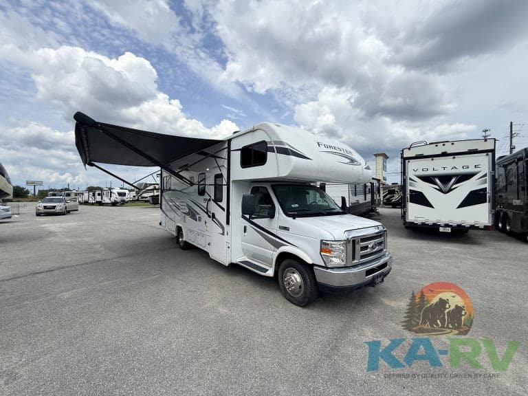 Forester 2501TS RV with extended awning for outdoor comfort.