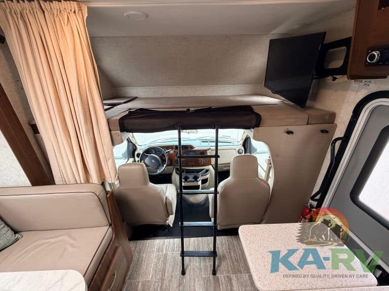 Interior view of a 2019 Forest River Forester RV, showcasing the driver's cabin and living area.