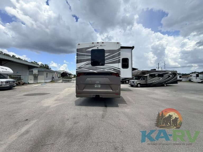 Rear view of 2025 Tiffin Allegro Bay 38AB motorhome in dealership lot.