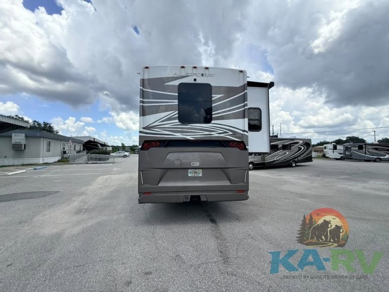 Rear view of 2025 Tiffin Allegro Bay 38AB RV in an RV lot.