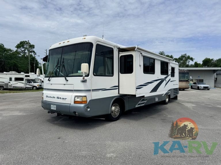 White Dutch Star RV with slide-outs parked at Karv Repair for maintenance.