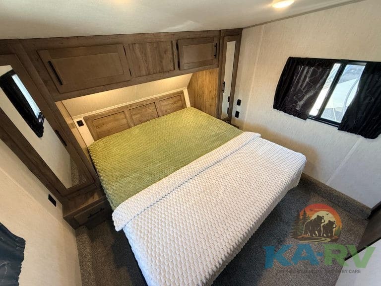 Interior view of bedroom in 2021 Forest River Cherokee Wolf Pack 325PACK13.