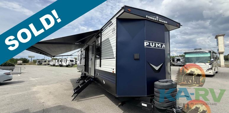 New Forest River Palomino Puma 39DBT-2 RV with full bedrooms and bathrooms.