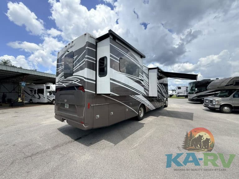 Luxury Tiffin Allegro Bay 38AB motorhome at RV dealership lot.