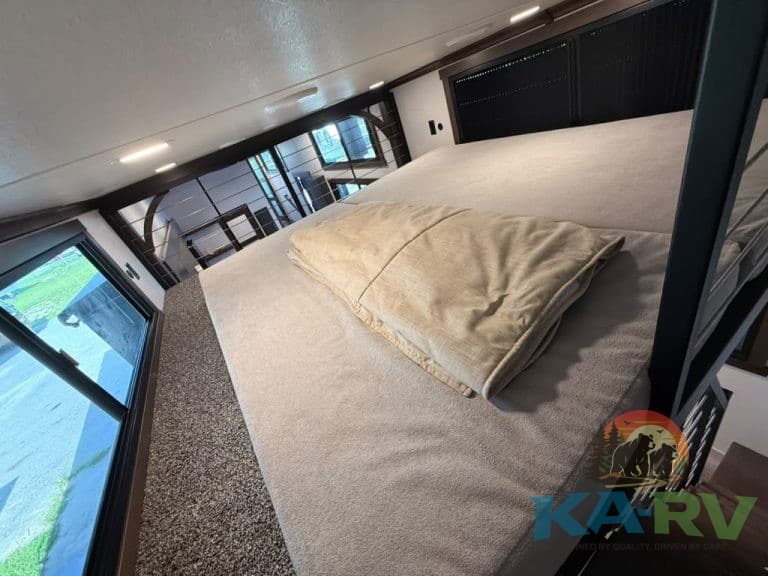 Interior of Cedar Creek Cottage 41 FWC with bed and windows.