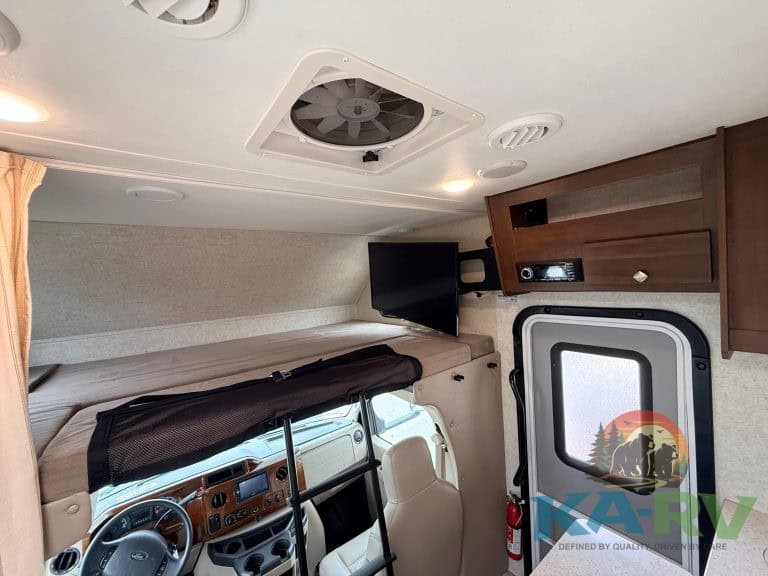 Accessible RV ceiling vent and entertainment system.