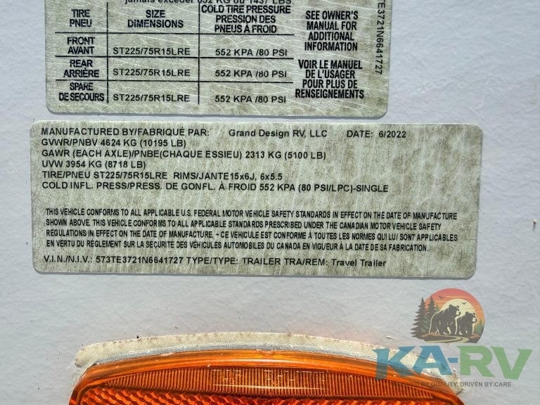 RV trailer tire label with specifications and safety information.