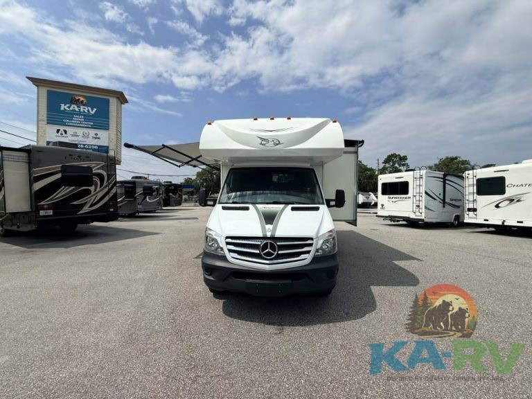 Mercedes-Benz RV parked at Karv Repair with other RVs in background.