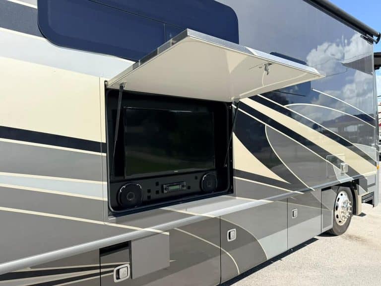 RV exterior with outdoor TV and entertainment system for 2018 Fleetwood Discovery 40X LXE.