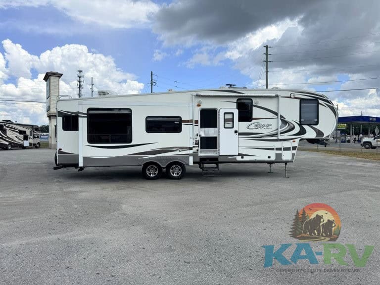 RV travel trailer with slide-outs and modern amenities.