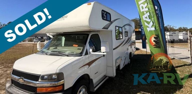 White 2013 Coachmen Freelander 23CB RV with sold banner.