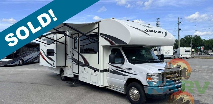 2018 Jayco Redhawk 31XL motorhome at RV dealership with SOLD banner.