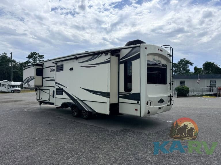 RV trailer with modern design and amenities for travel and camping.