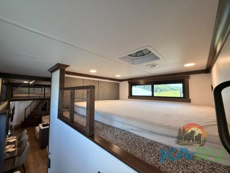 Interior view of Cedar Creek Cottage 41 FWC with sleeping area and window.