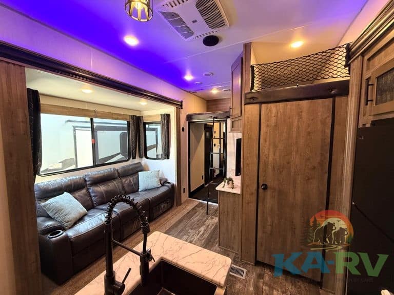 Interior view of a 2021 Forest River Cherokee Wolf Pack 325PACK13 RV.