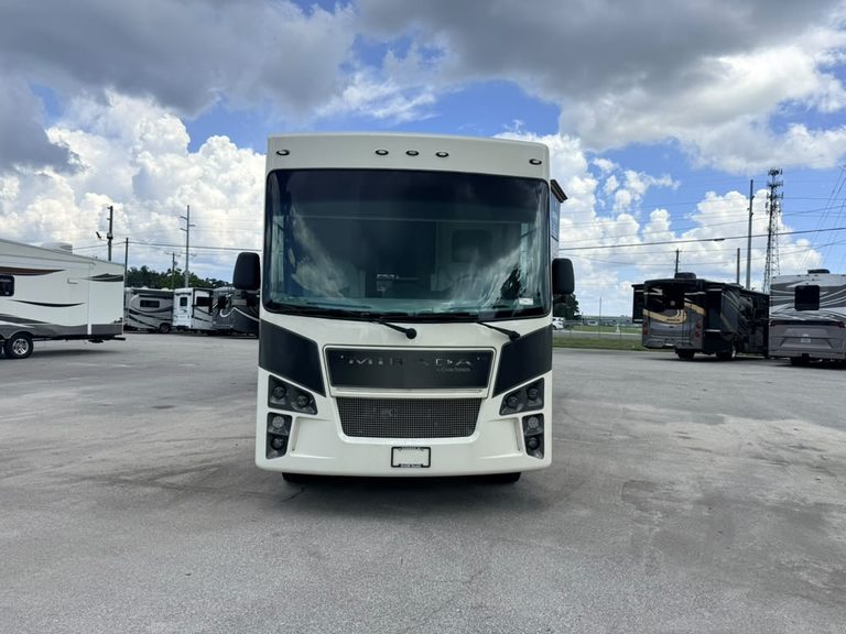 Front view of 2023 Coachmen Mirada 35OS motorhome at RV dealership.