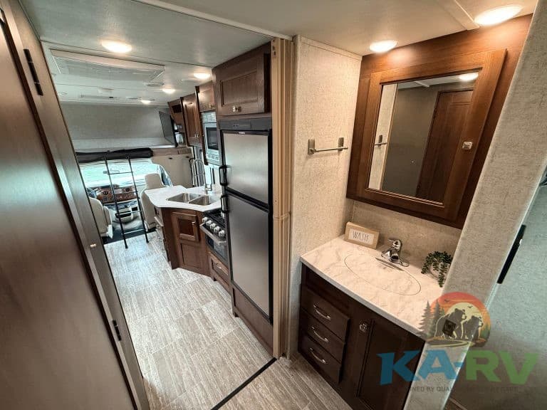 Interior view of a 2019 Forest River Forester 2501TS RV showing kitchen and living area.