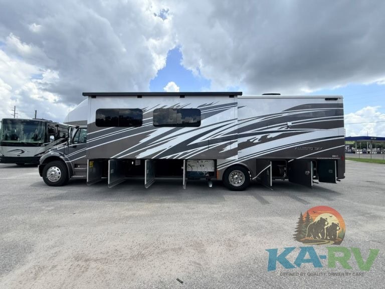 Side view of 2025 Tiffin Allegro Bay 38AB motorhome in parking lot.