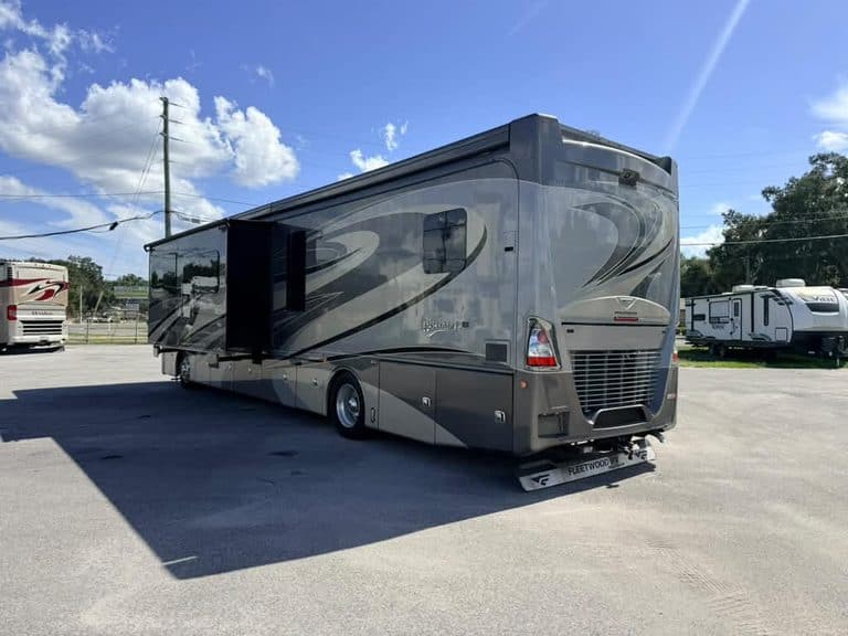 Luxury 2018 Fleetwood Discovery RV parked outdoors for repair.