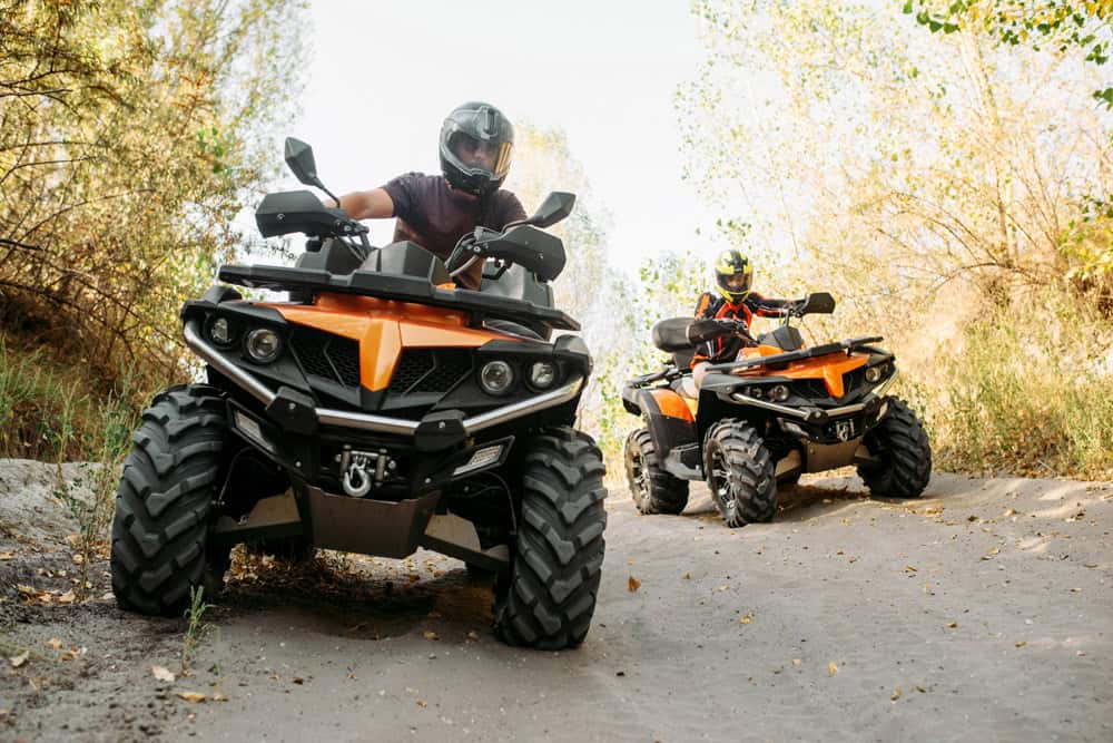 ATVs on a dirt road. Did you know you can do this as one of your outdoor activities in Orlando?