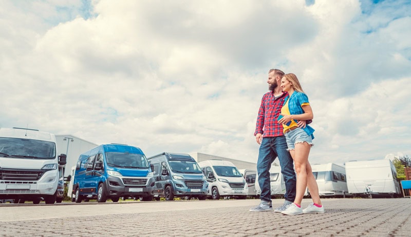 A couple walks through an RV lot. Access to customers like these is one reason to consign your RV
