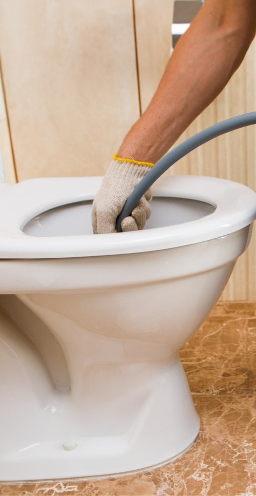 unclogging toilet with hydro jet