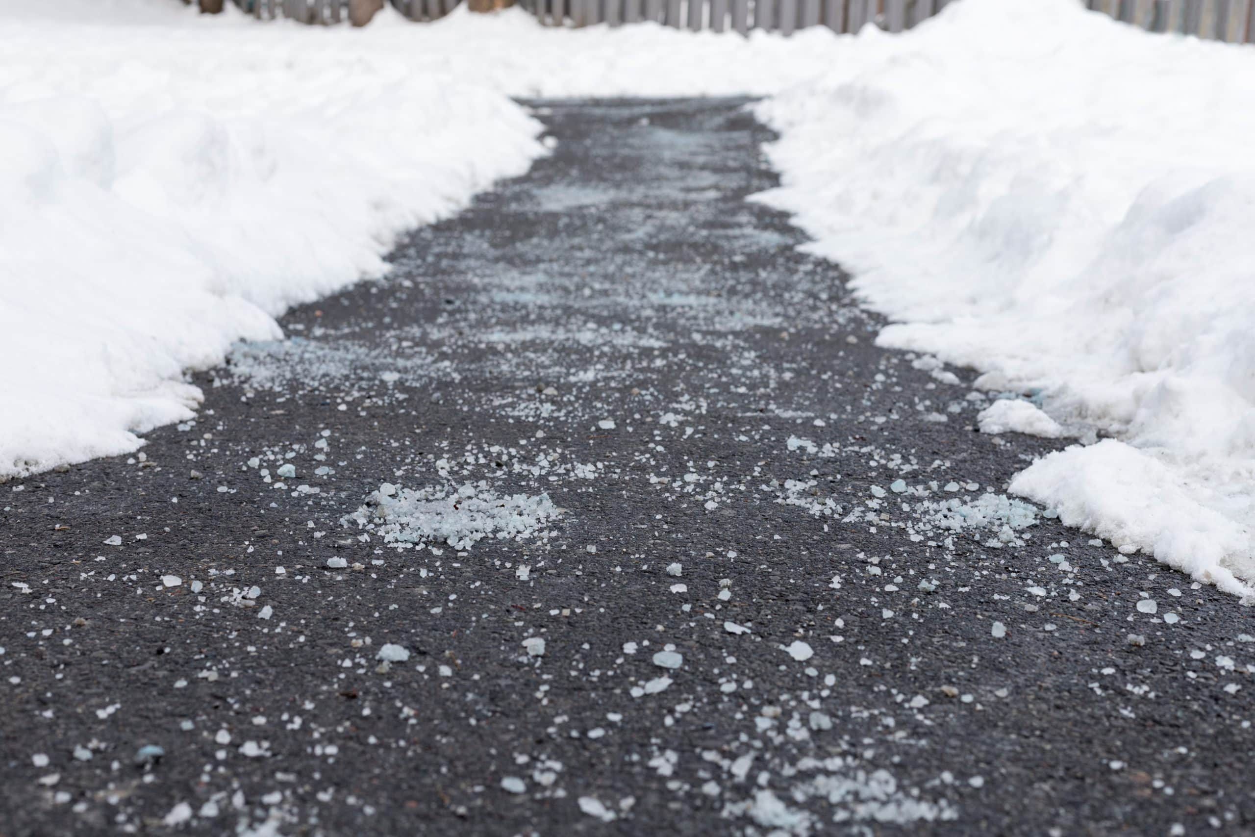 Winter road with salt for melting snow