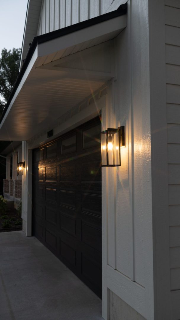 Garage with stylish exterior lighting and modern design elements.