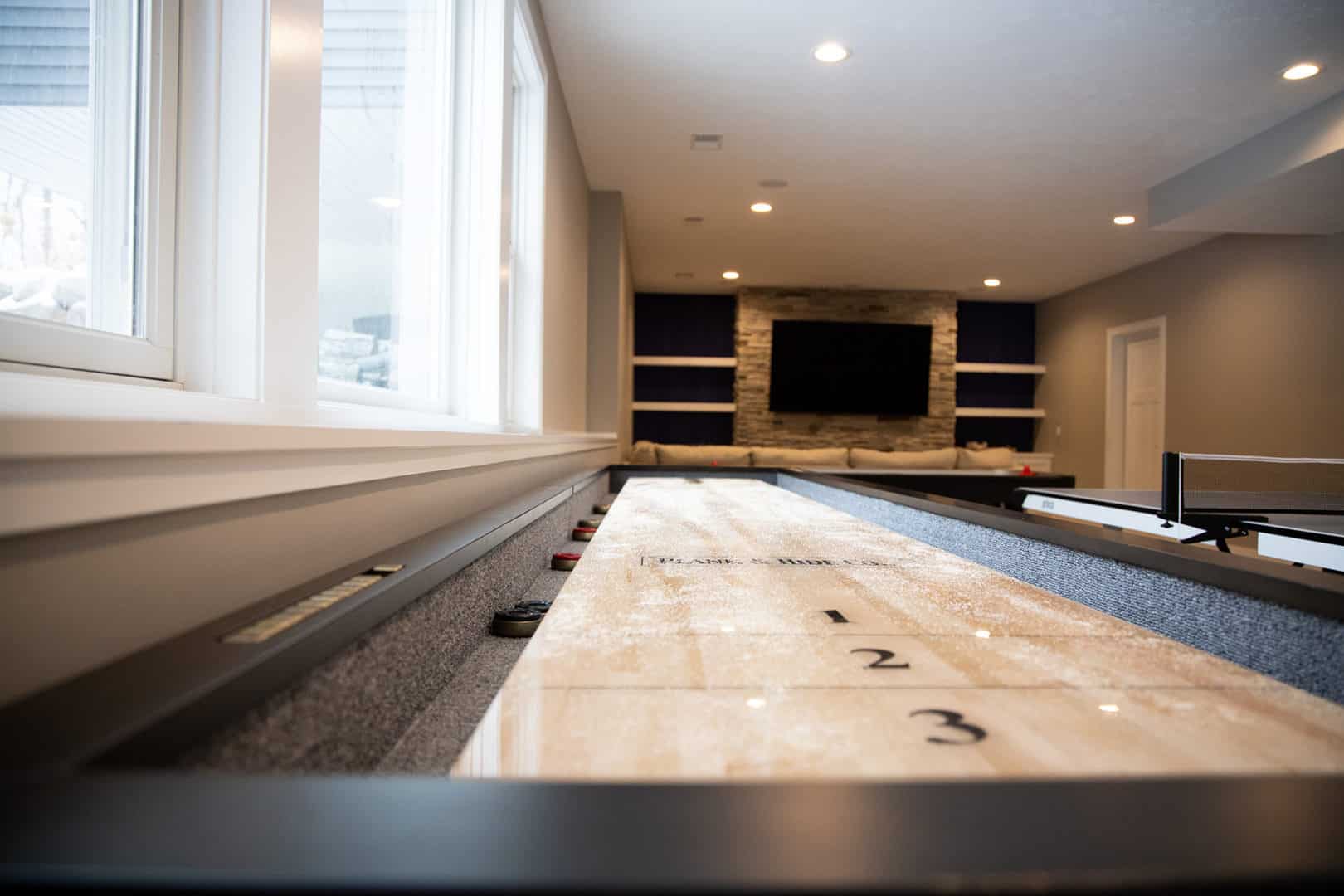 Indoor shuffleboard table at Livingston Homes.