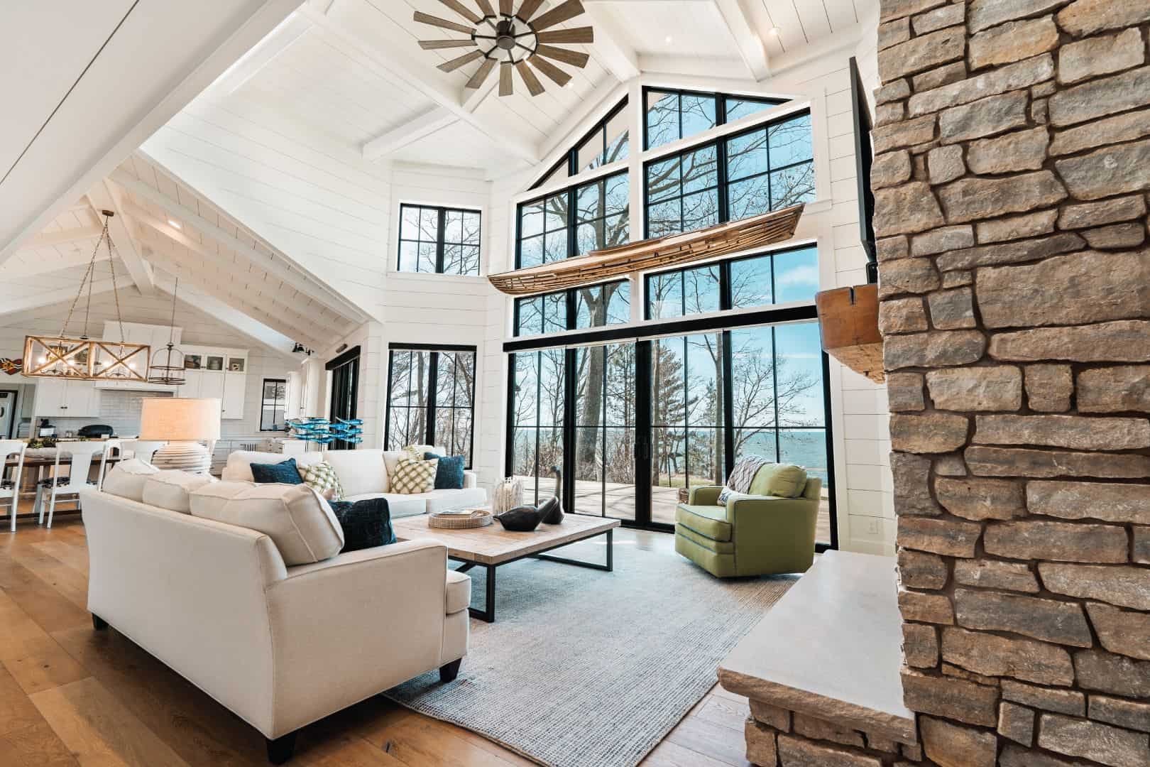 Livingston Homes interior with spacious, bright living room featuring large windows and contemporary.