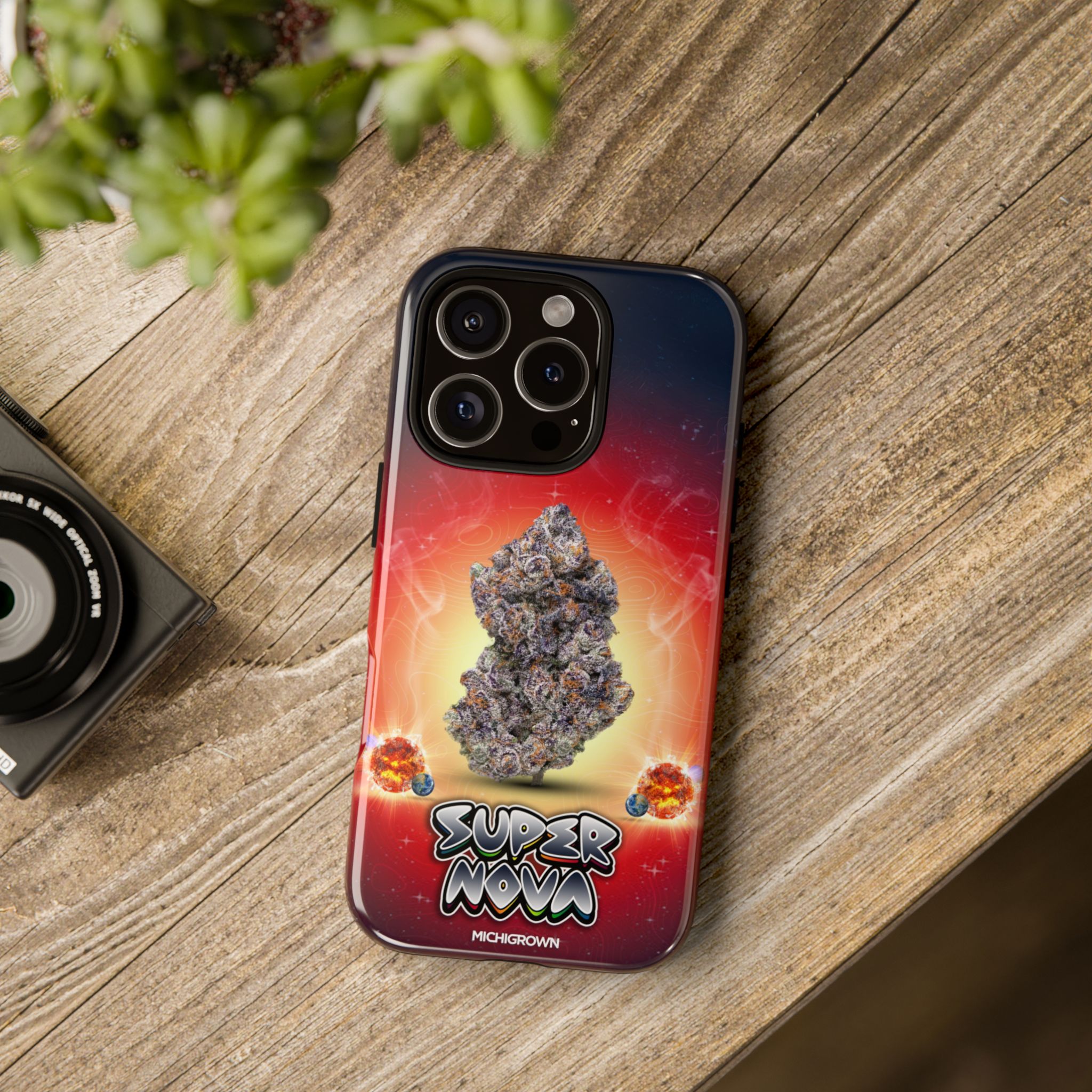 Phone case featuring a cannabis bud and cosmic background for Super Nova Phone Case.