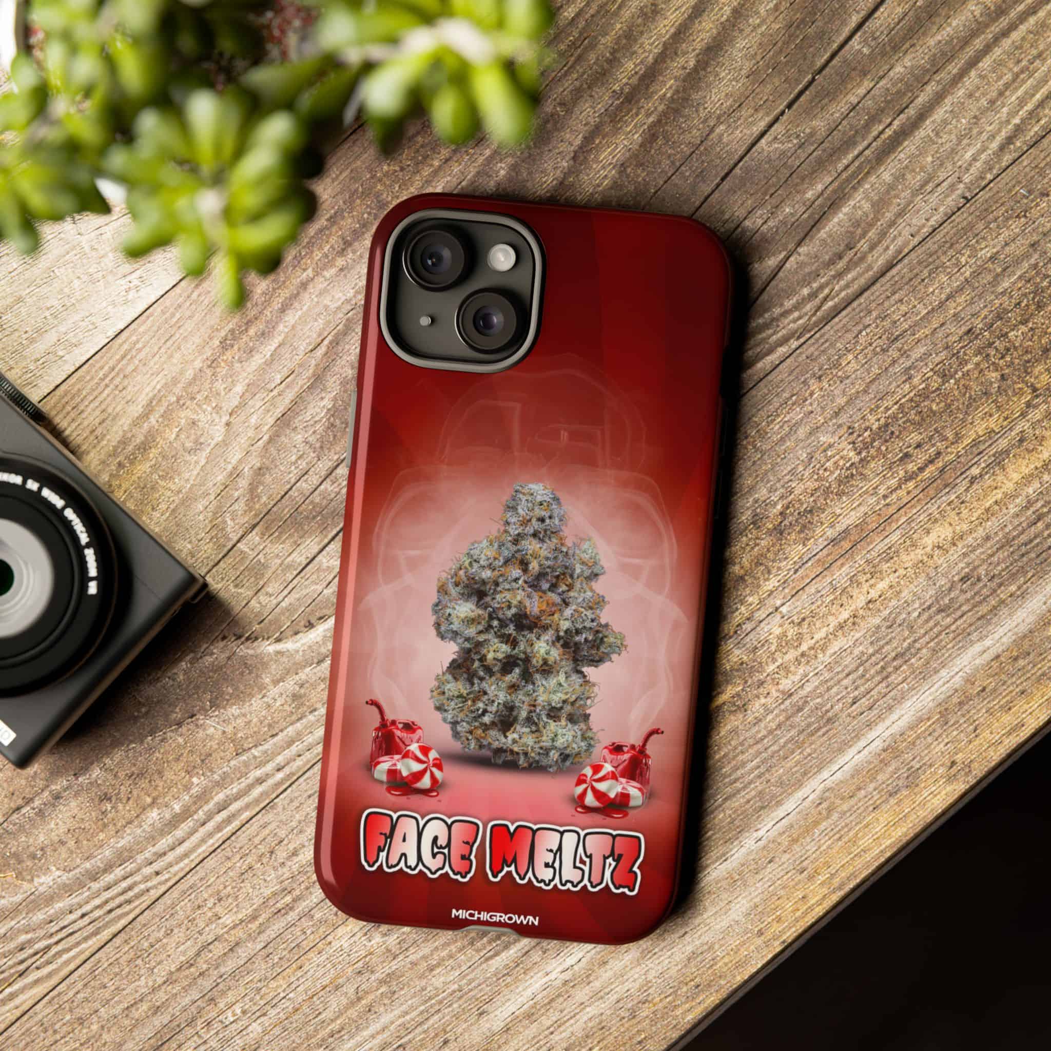 Red phone case with cannabis bud and Face Meltz logo for FACE MELTZ Tough Cases.