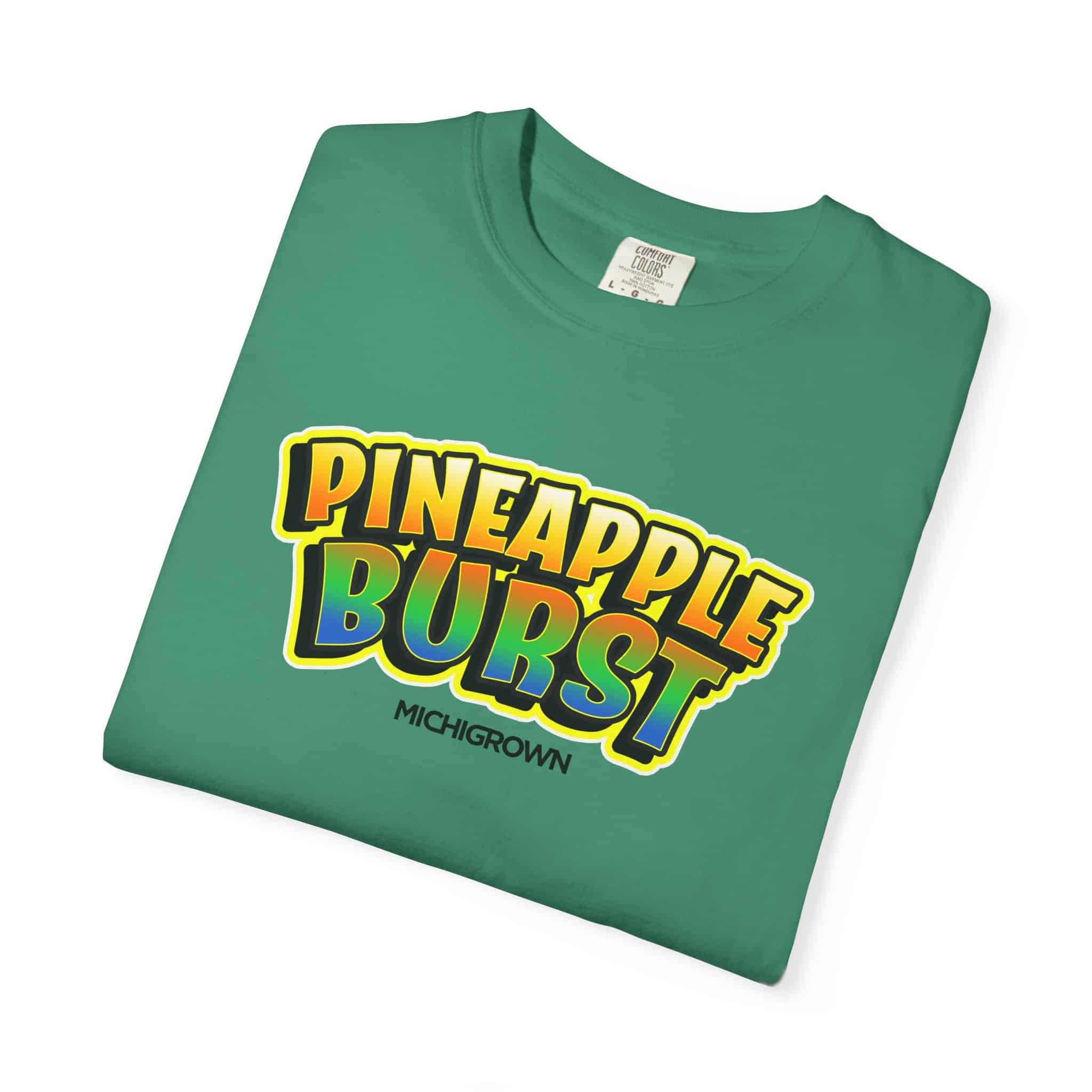 Green T-shirt with Pineapple Burst logo and Michigrown branding.