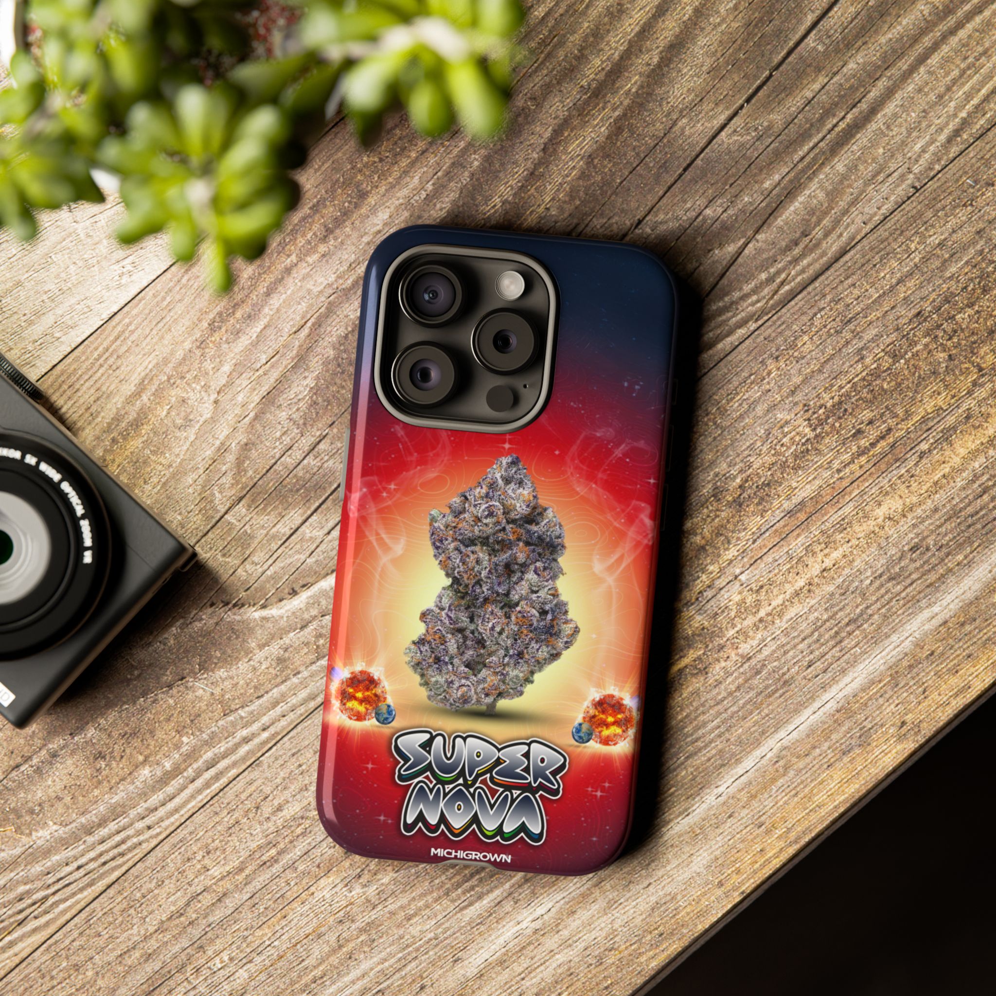 Phone case featuring a cannabis bud and cosmic background for Super Nova Phone Case.