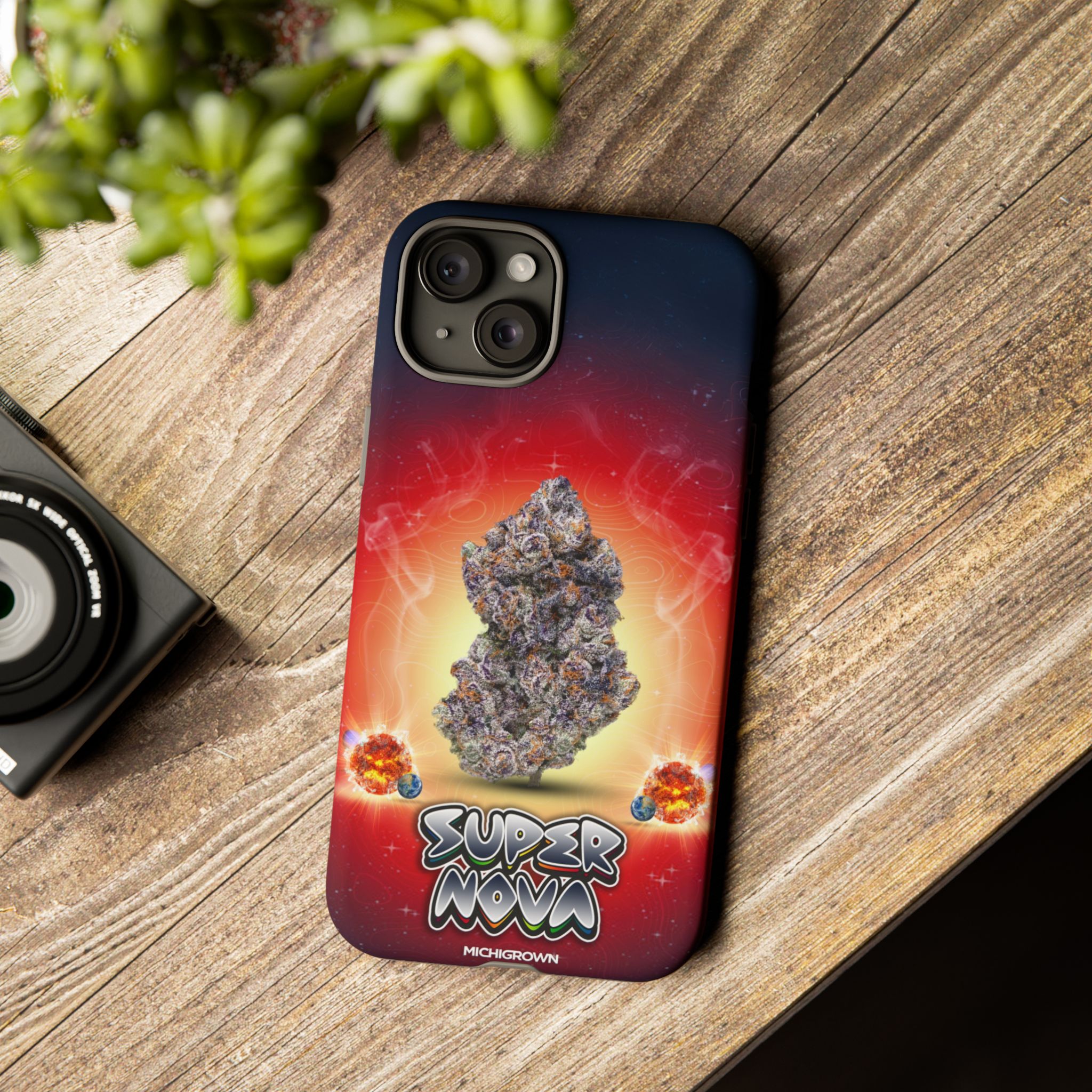 Phone case with Super Nova design featuring a large cannabis bud and cosmic background.