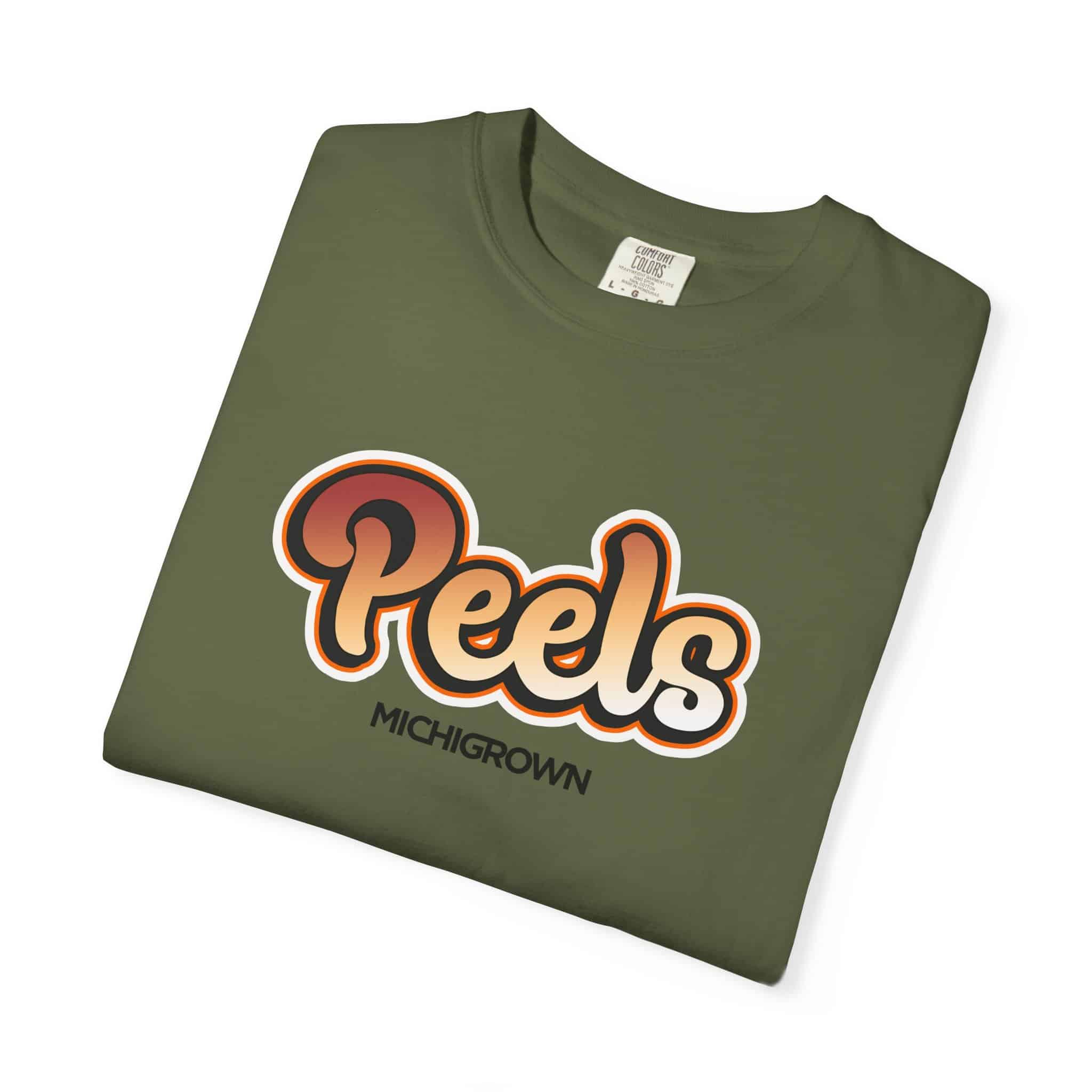 Green T-shirt with Peels Michigrown logo in bold letters.