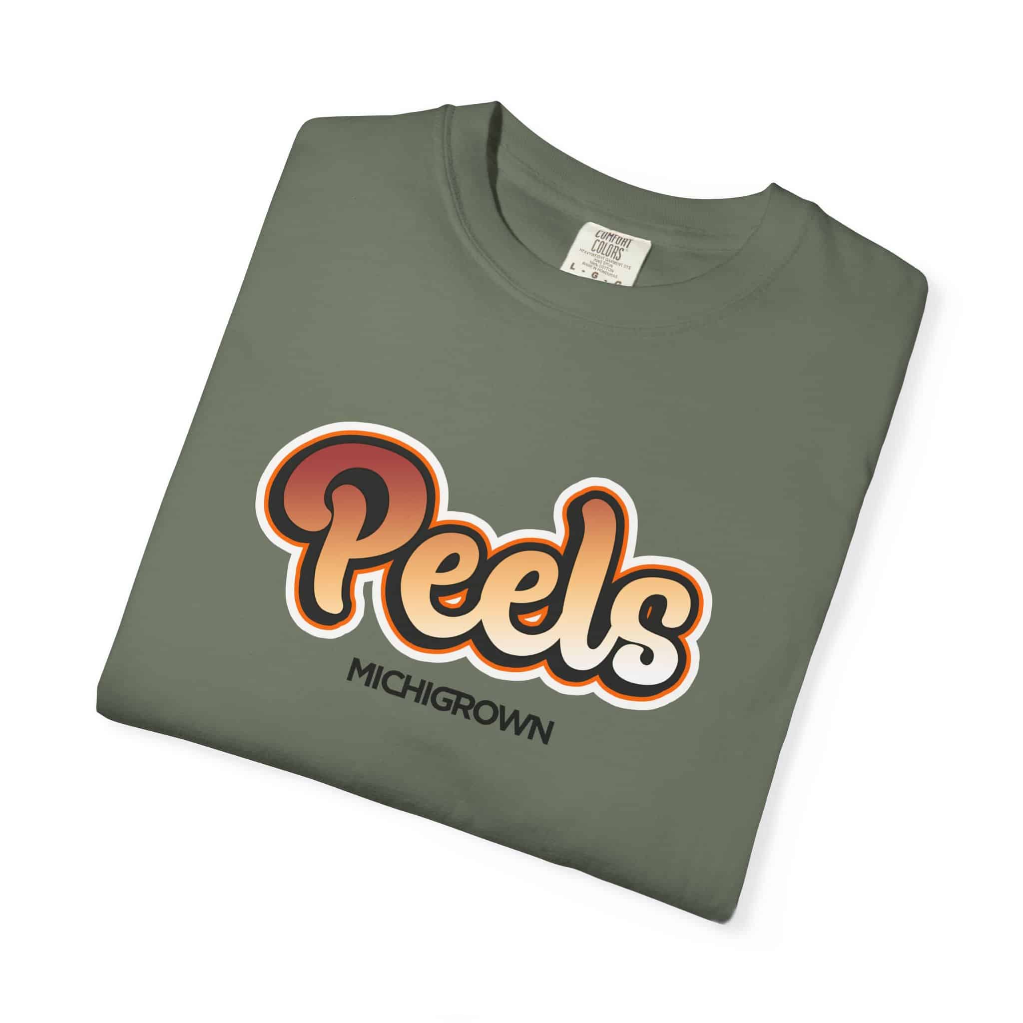 Green T-shirt with Peels Michigrown logo in bold letters.