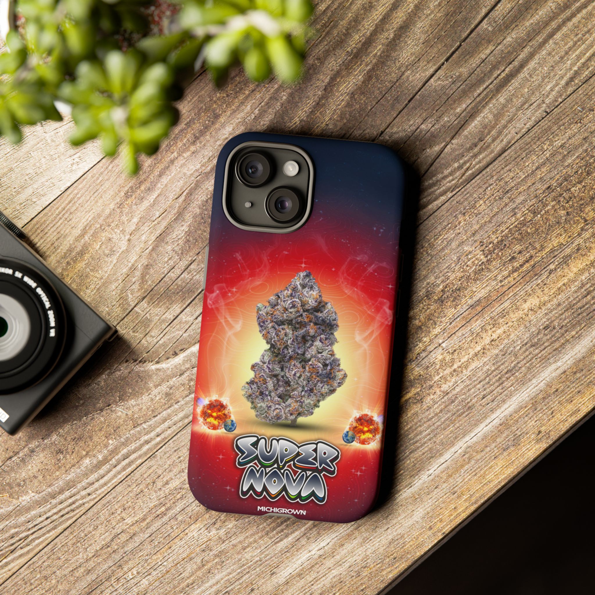 Phone case featuring a cannabis bud and cosmic background for Super Nova Phone Case.