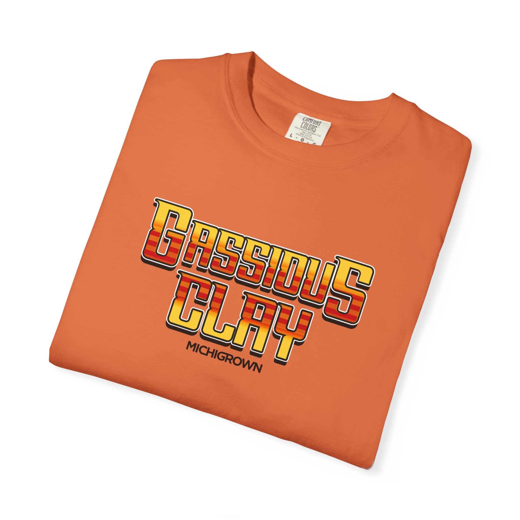 Orange Gassious Clay T-shirt with bold text design for Michigan fans.