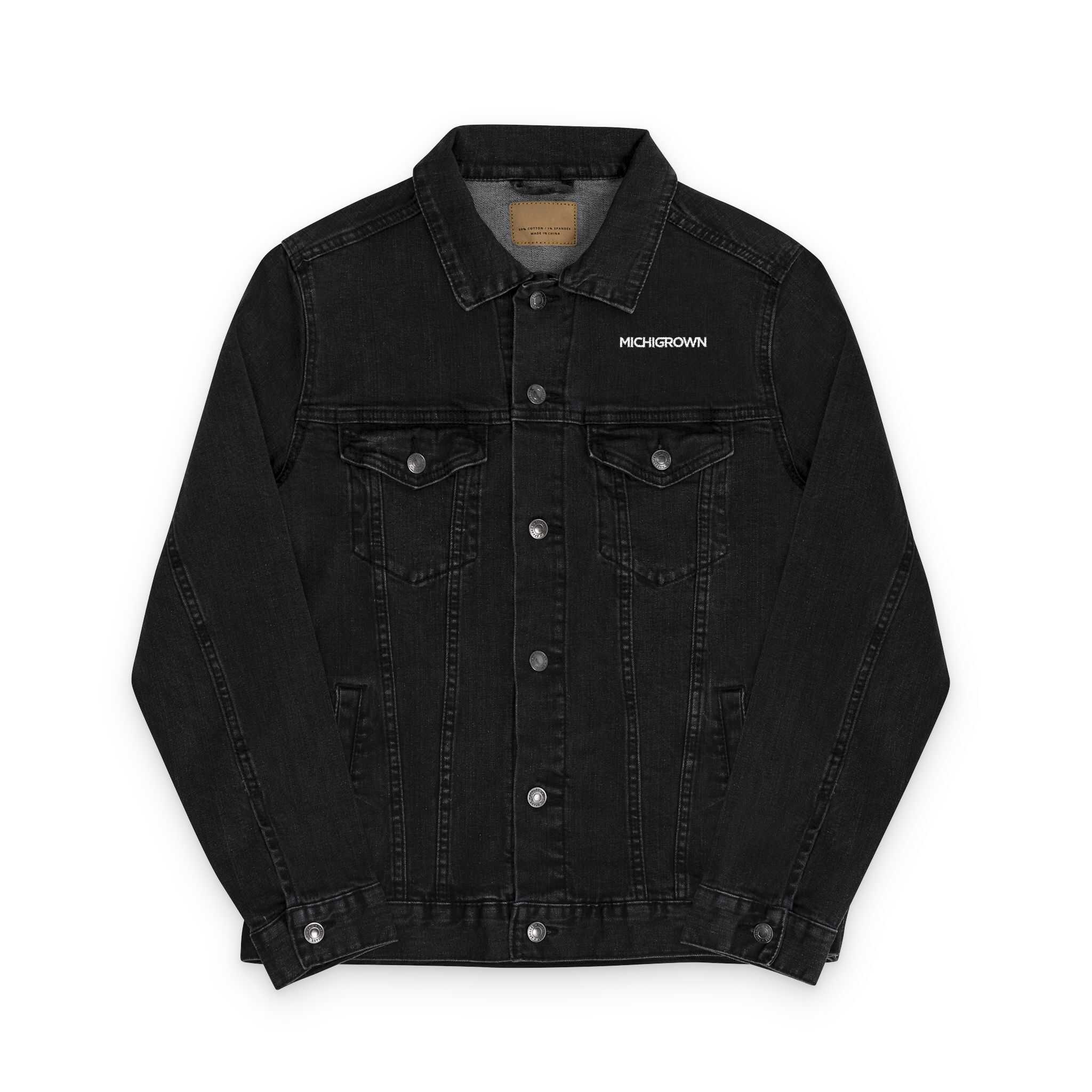 Black denim jacket with embroidery detail and button closure.