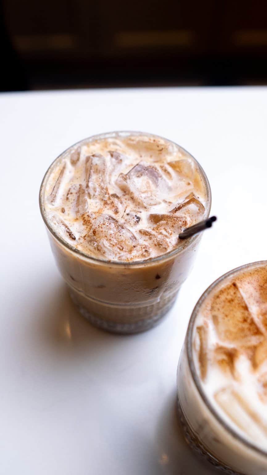 Refreshing iced coffee with milk and ice, perfect for hot days.