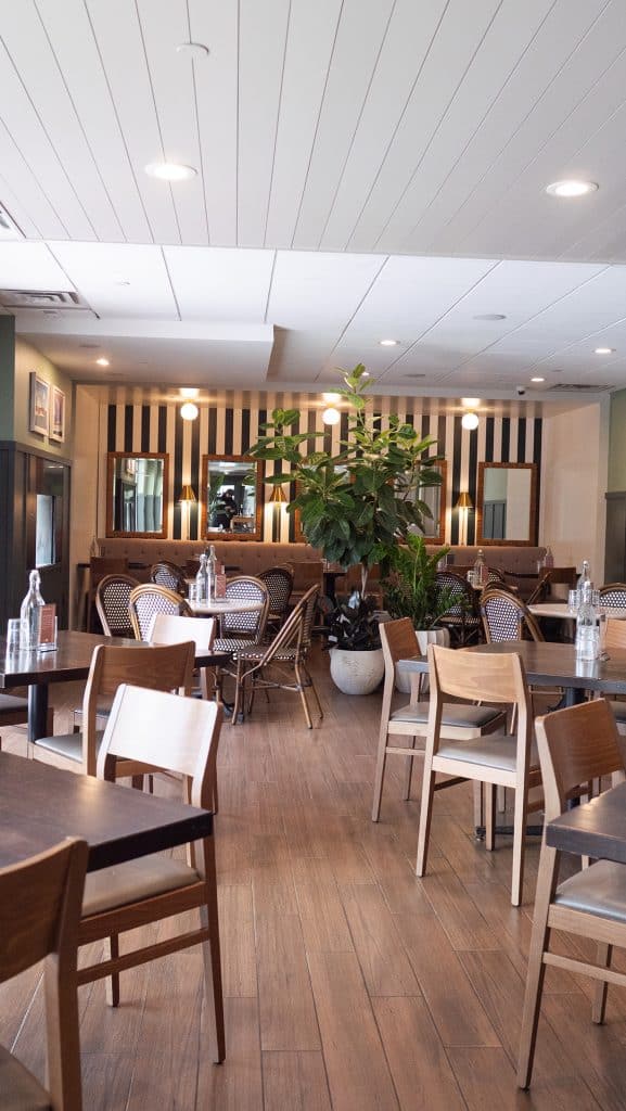 Elegant private event space with stylish decor and comfortable seating at Mudpenny. Perfect for spec.