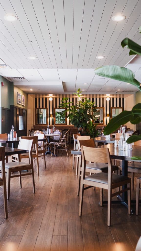 Cozy indoor dining space at Spring Lake with modern decor and natural light.