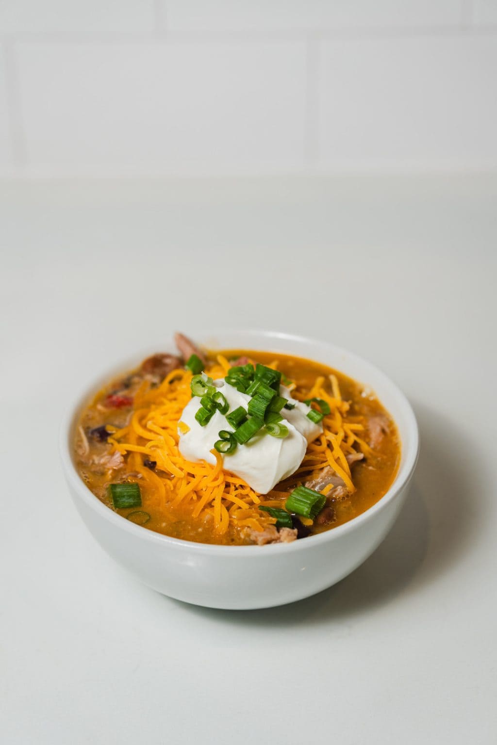 Creole chili with chicken, andouille sausage, beans, and Cajun spices.