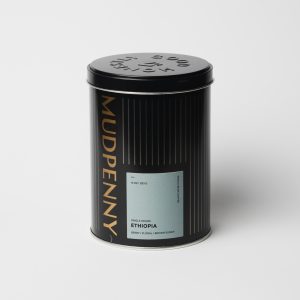 Mudpenny decaf coffee tin with Ethiopia single origin label.
