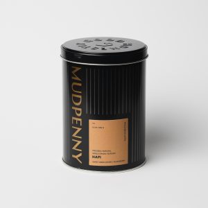 Decaf coffee tin by Mudpenny with black and copper design.