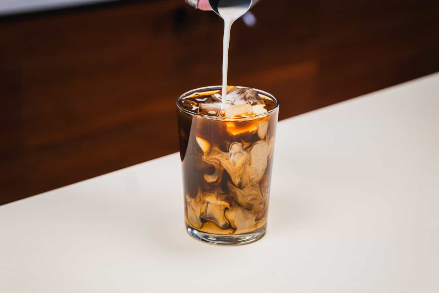 Cold brew coffee with cream, refreshing beverage for spring.