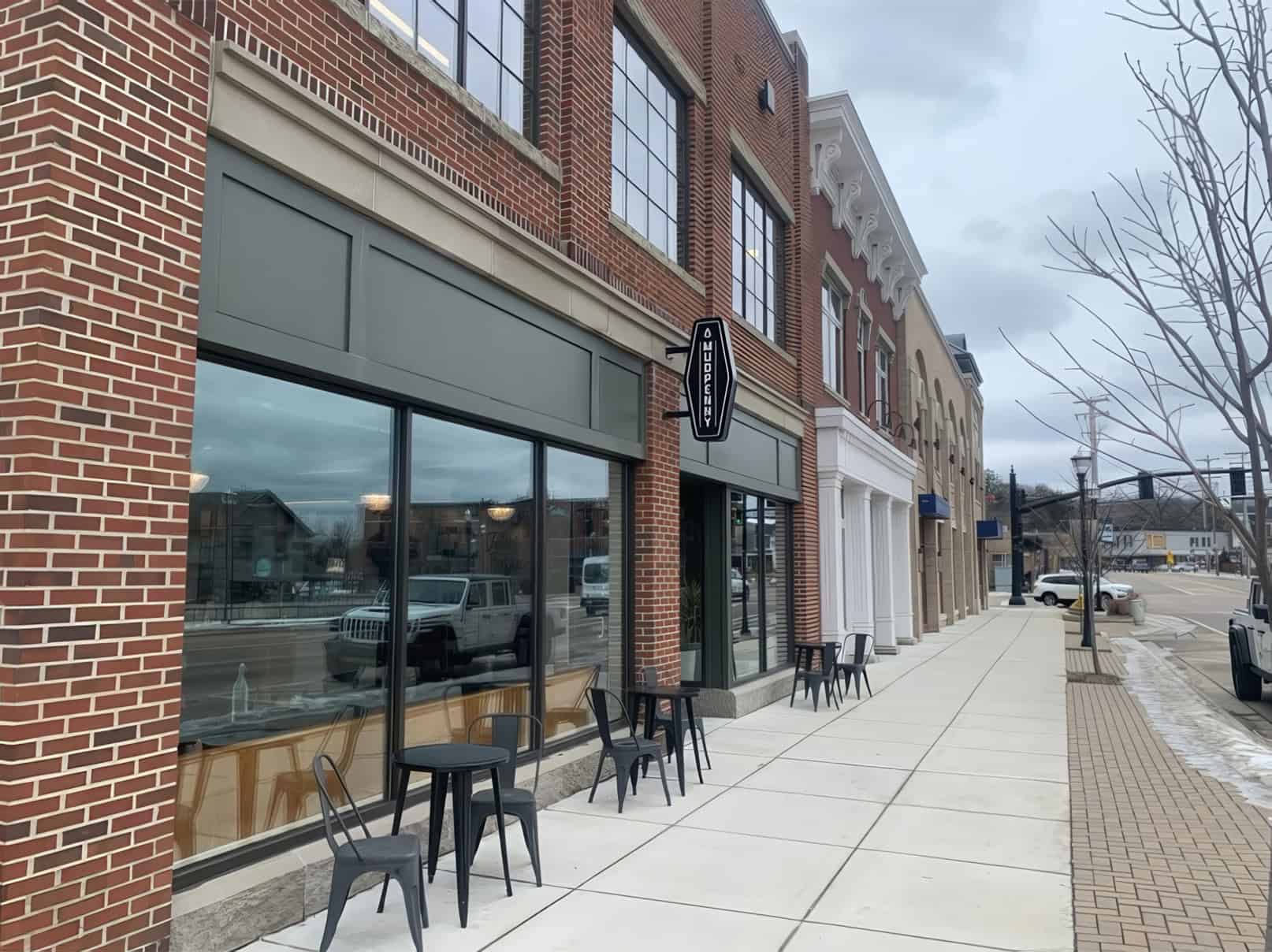 Mudpenny café exterior with outdoor seating on Main Street.