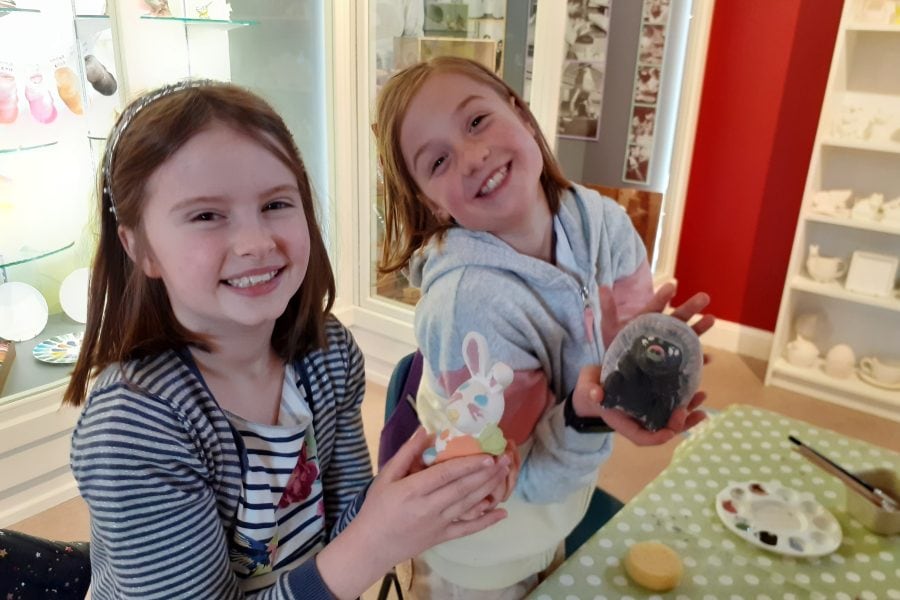 Museum of Royal Worcester - Paint your own pottery two girls having fun painting animal figurines