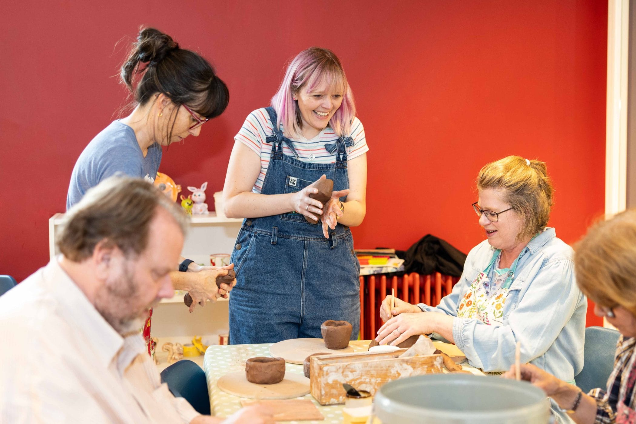 Participants creating with Earthenware Clay
